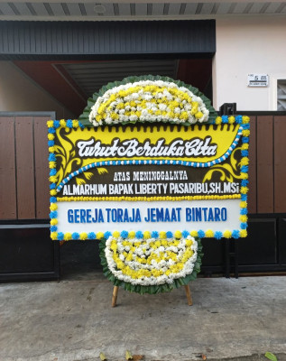 Papan Bunga Duka di Teor
